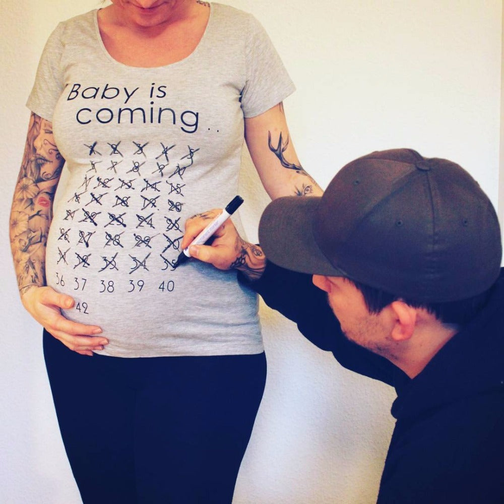 Celebrate the News: “Baby Is Coming” Pregnancy Shirt